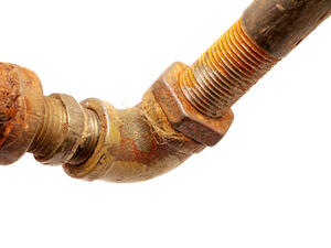 Aged or corroded pipes are a common source of moisture intrusion in a building.