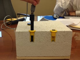 An image of what an in-situ probe looks like in concrete to measure humidity.