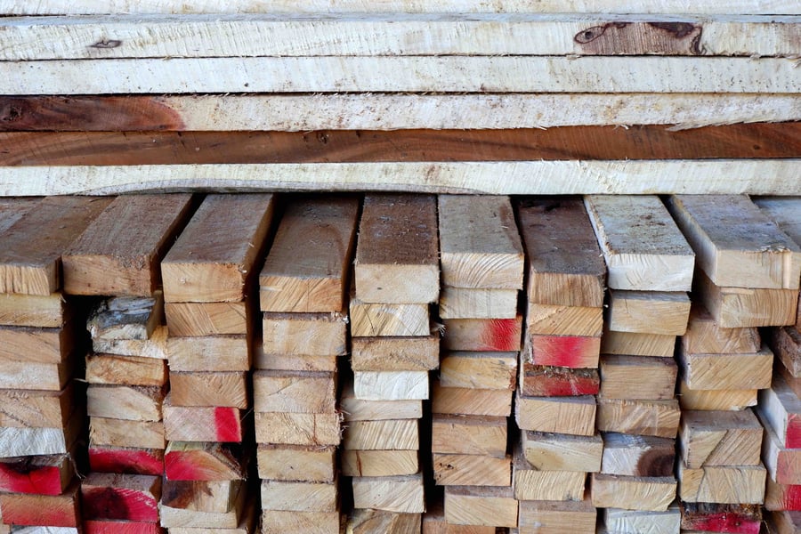Stacks of rough lumber with moisture issues
