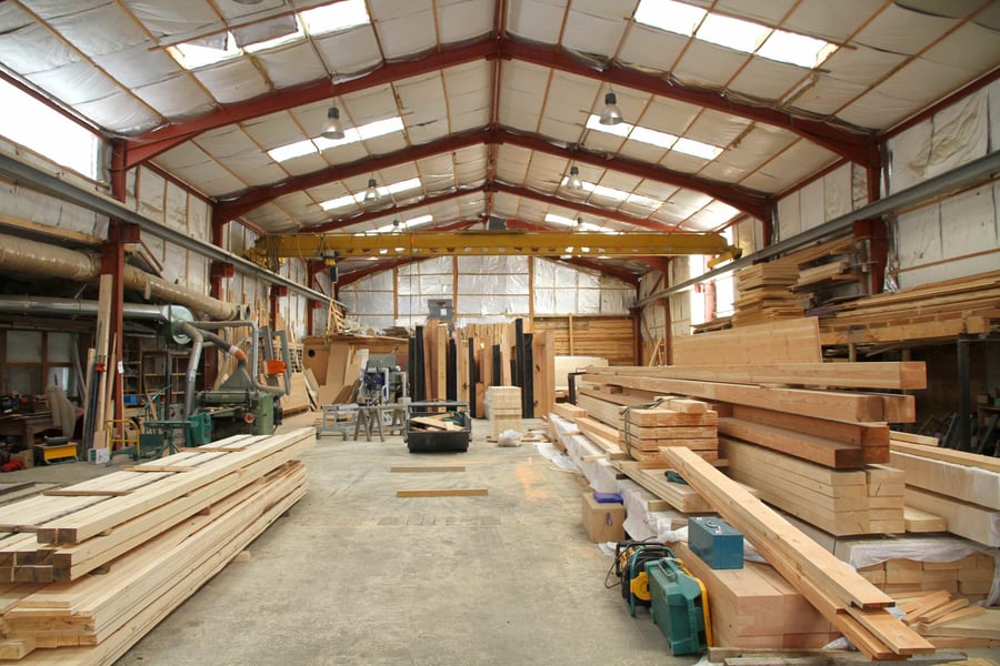 Wood Workshop with Stacked Lumber